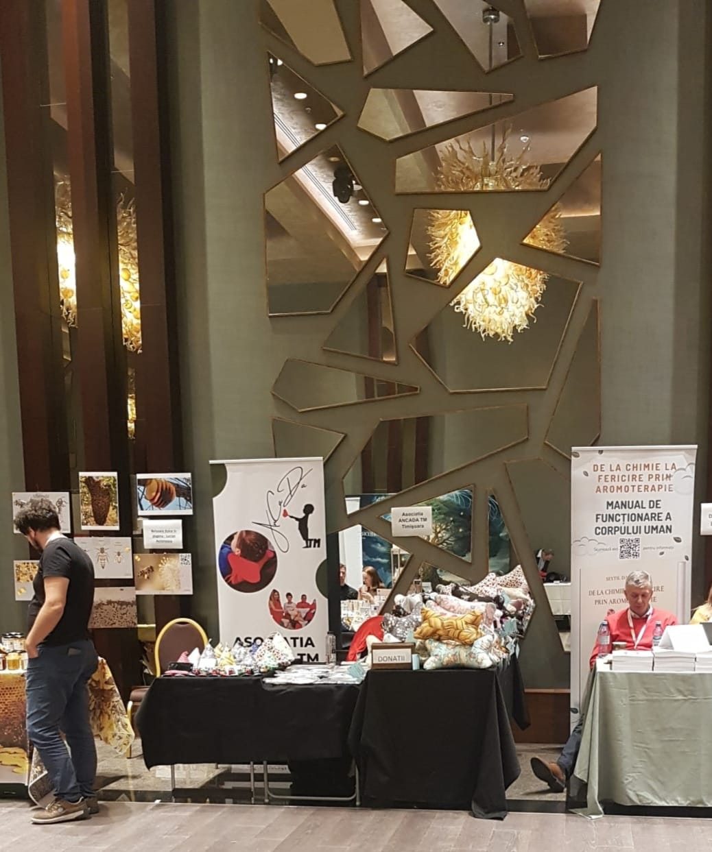 Standul ANCADA TM la expoziție cu produse și materiale informative